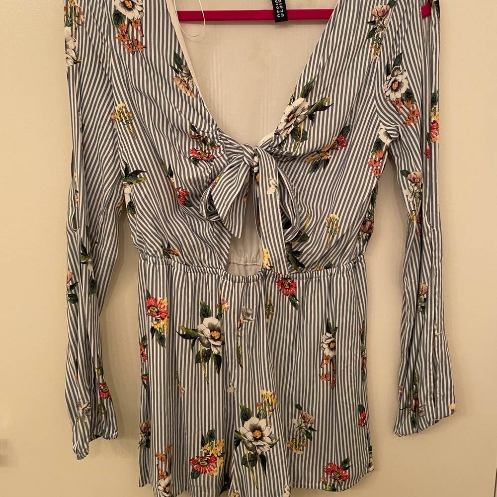 Floral long sleeved romper